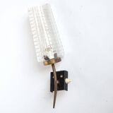 Glass and brass wall light