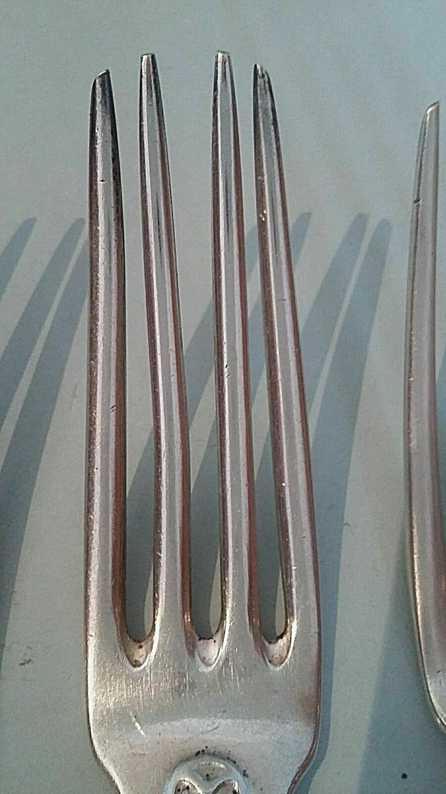 Set of six forks including three in white metal alloy SFAM a Christofle