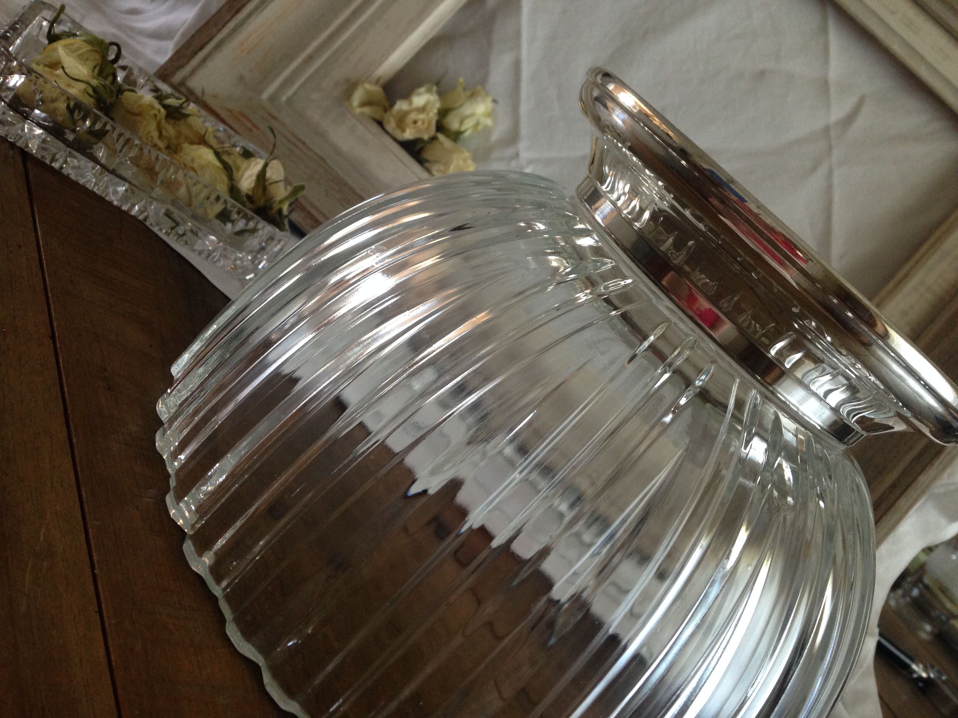 silver metal stand glass bowl