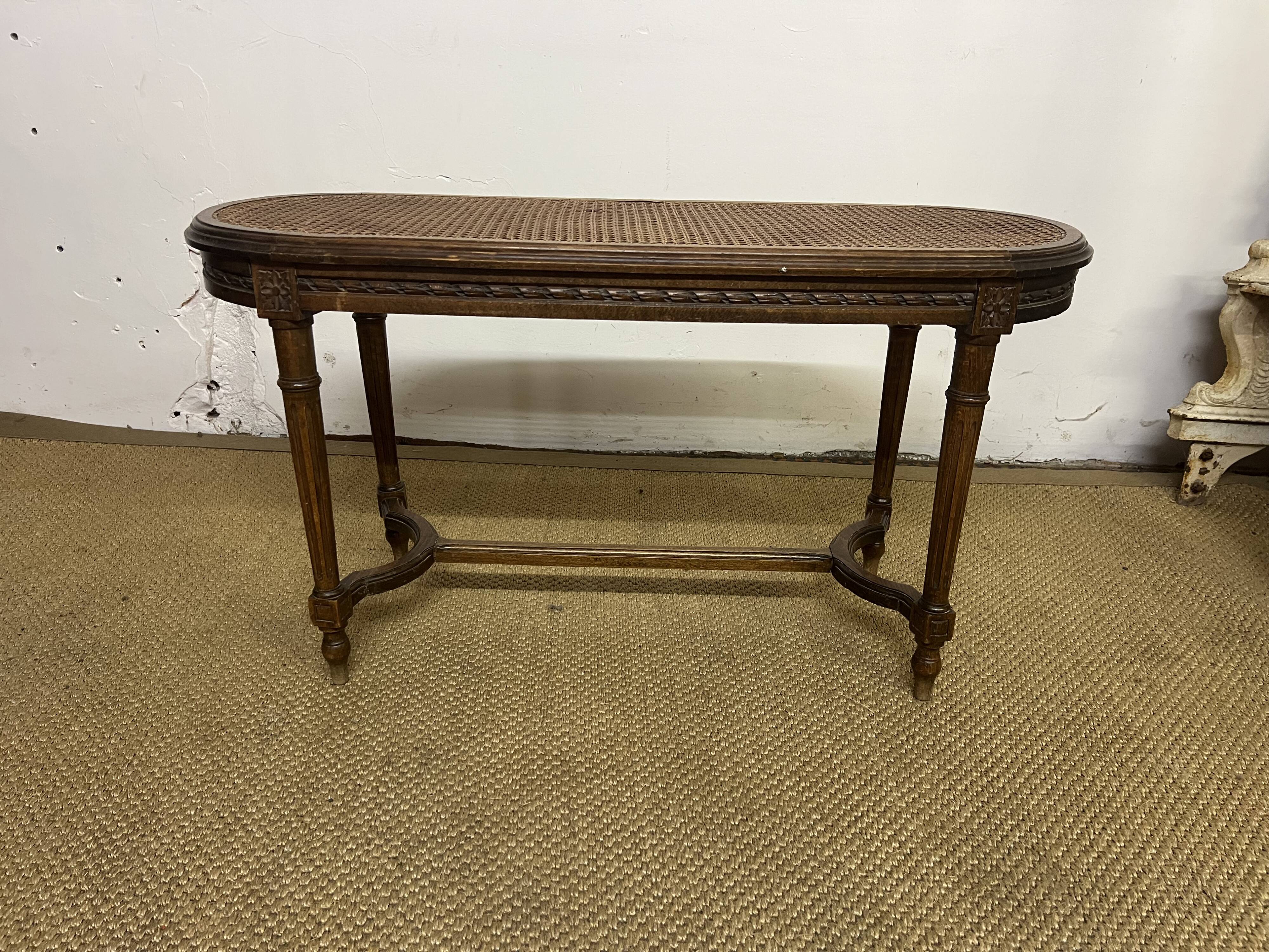 Louis XVI piano bench with caning