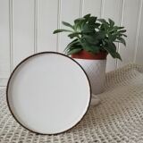 White broc in enamelled sheet metal