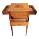 Nightstand with veneer and 4 drawers.