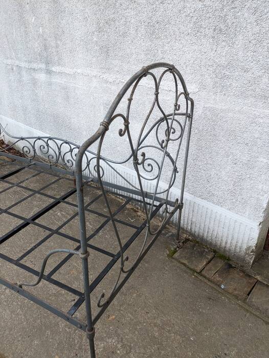 Metal folding bed, wrought iron bench
