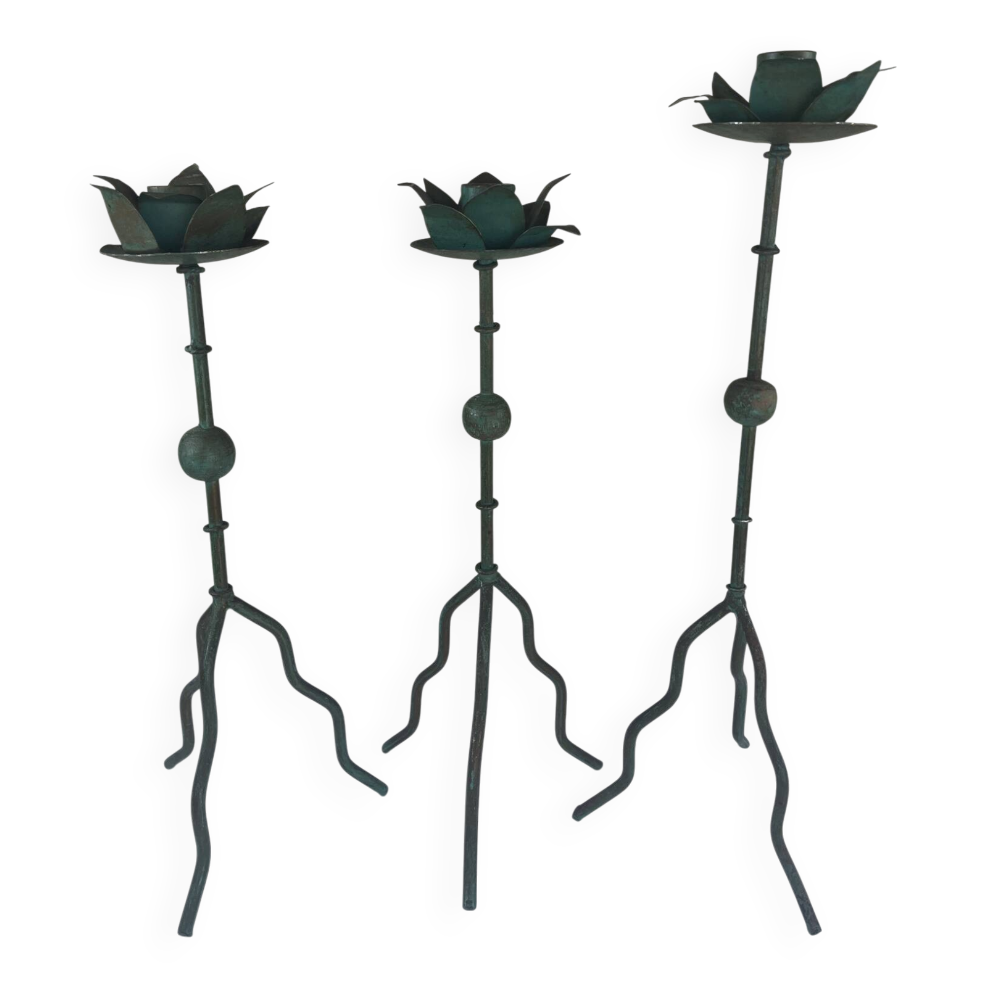 Sculptural candle holder trio