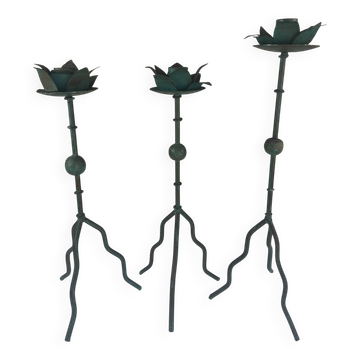 Sculptural candle holder trio