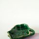 Leaf-shaped earthenware catchall, green and gold, 1970.