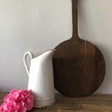 Old pitcher in enamelled sheet metal