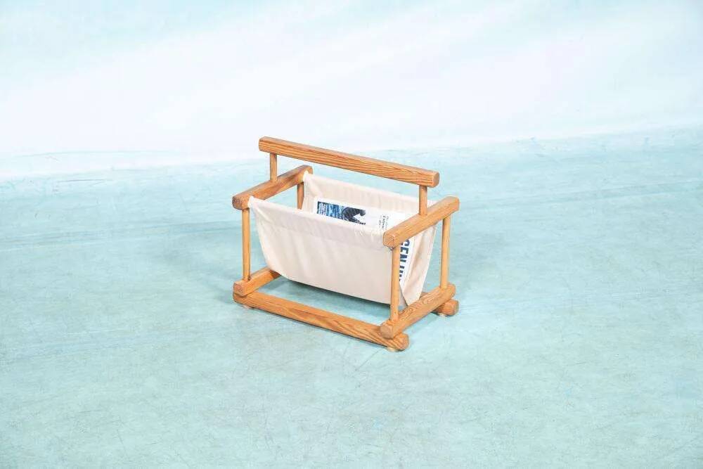 Bohemian magazine rack in vintage 70s pine style.