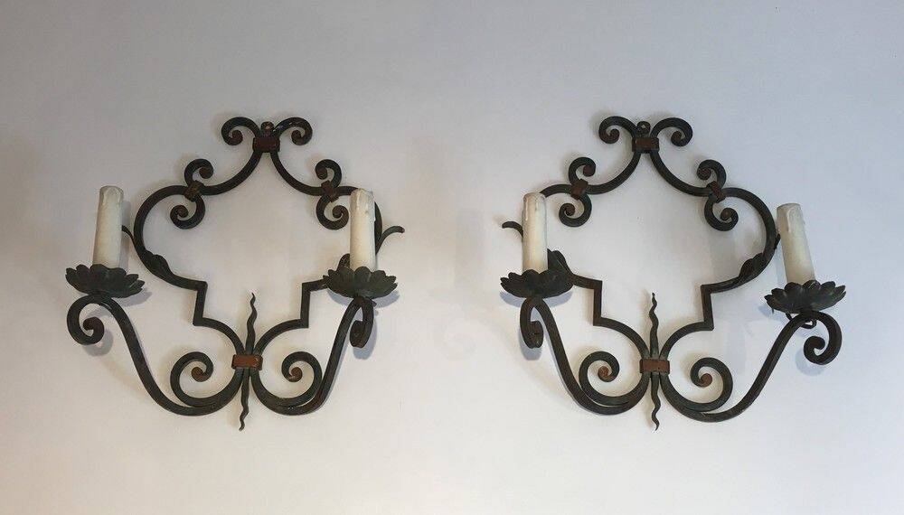 Pair of large decorative wrought iron wall sconces