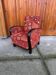 Red Art Deco armchair in patterned "nouveau" fabric, solid wood frame, 1930s.