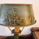 Metal bouillotte lamp, Empire style, green metal shade.