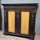 Italian Renaissance style caryatid bookcase in blackened wood