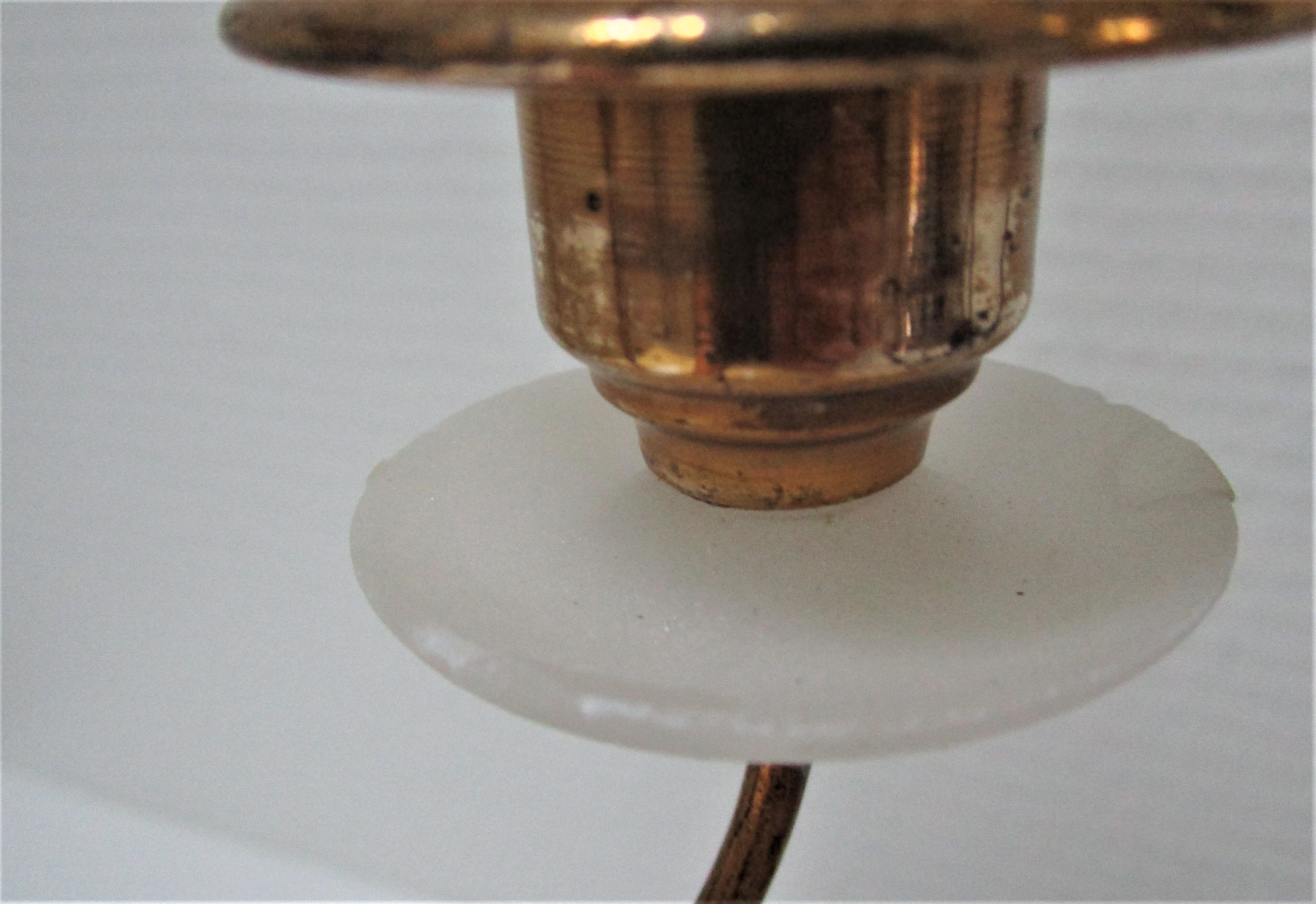 Pair of brass and three-pointed stone candelabra candle holders early twentieth century