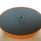 Old vintage orange round mirror