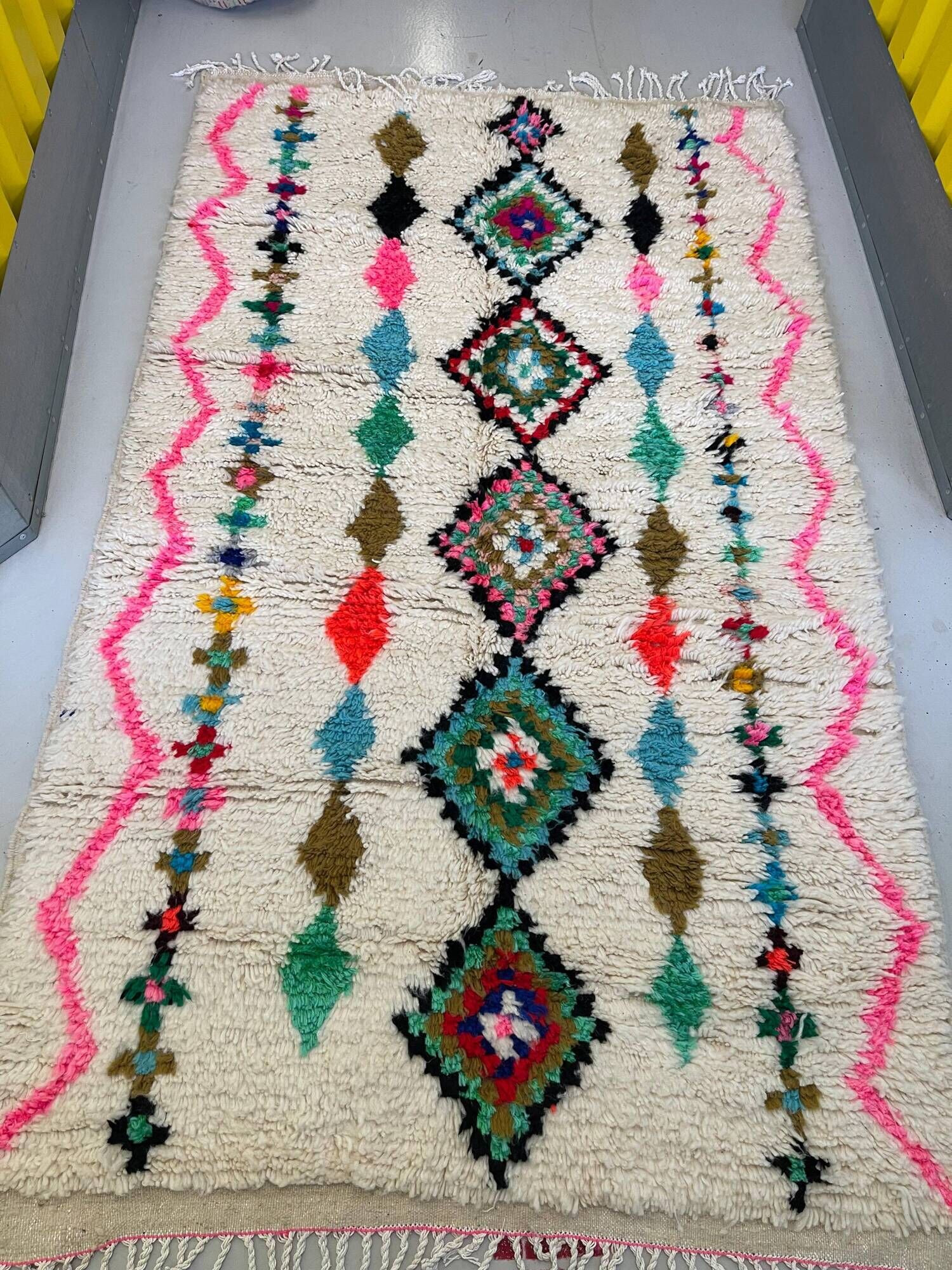 Moroccan Berber rug in ecru with multicoloured diamonds and bright pink – 240 × 139