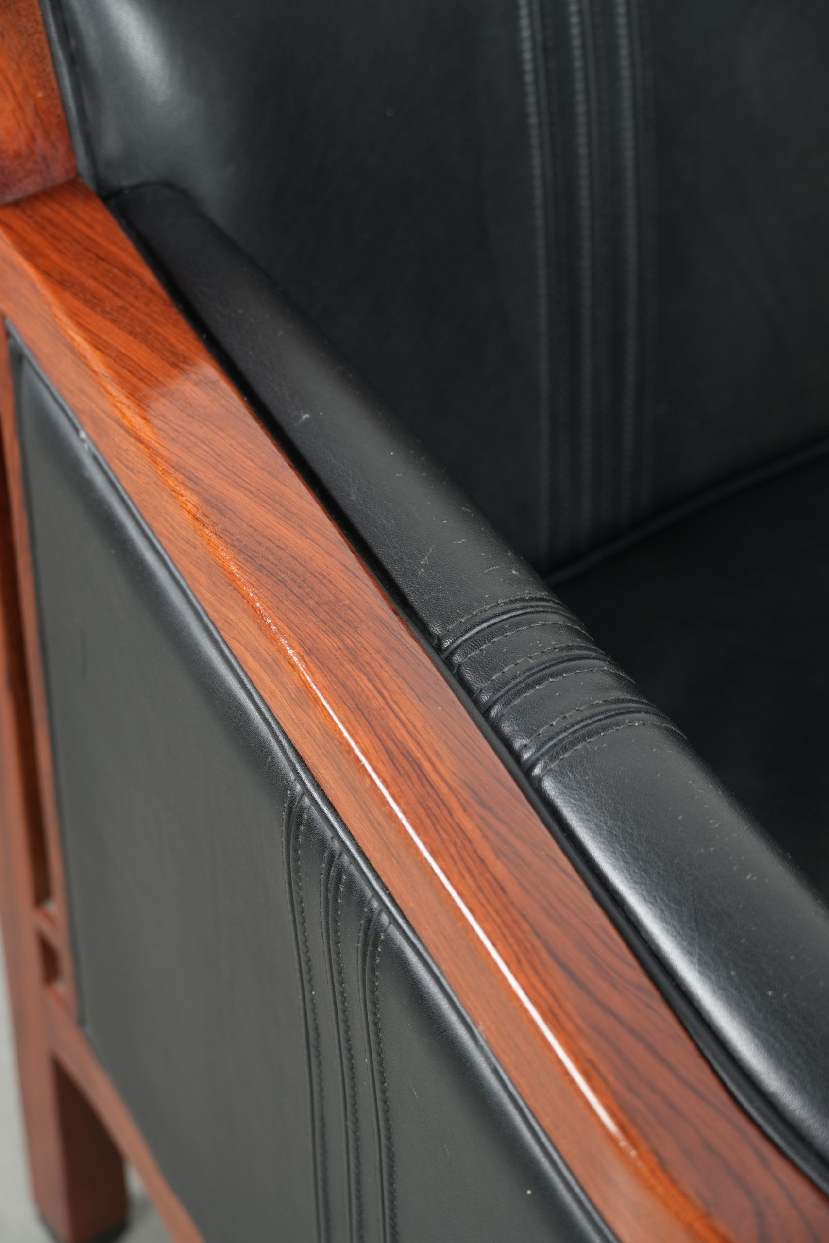 Black leather and wooden Art Deco design armchair