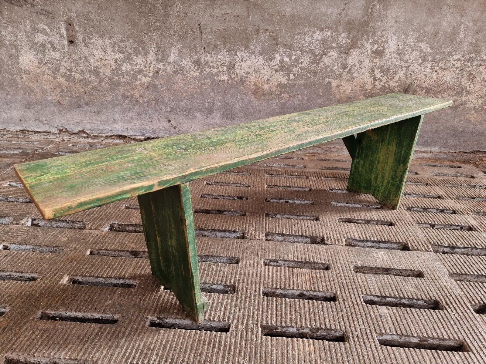 Old wooden bench side table grass green