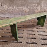 Old wooden bench side table grass green