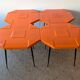 Set of 4 orange fibreglass tables from the 70s space age.