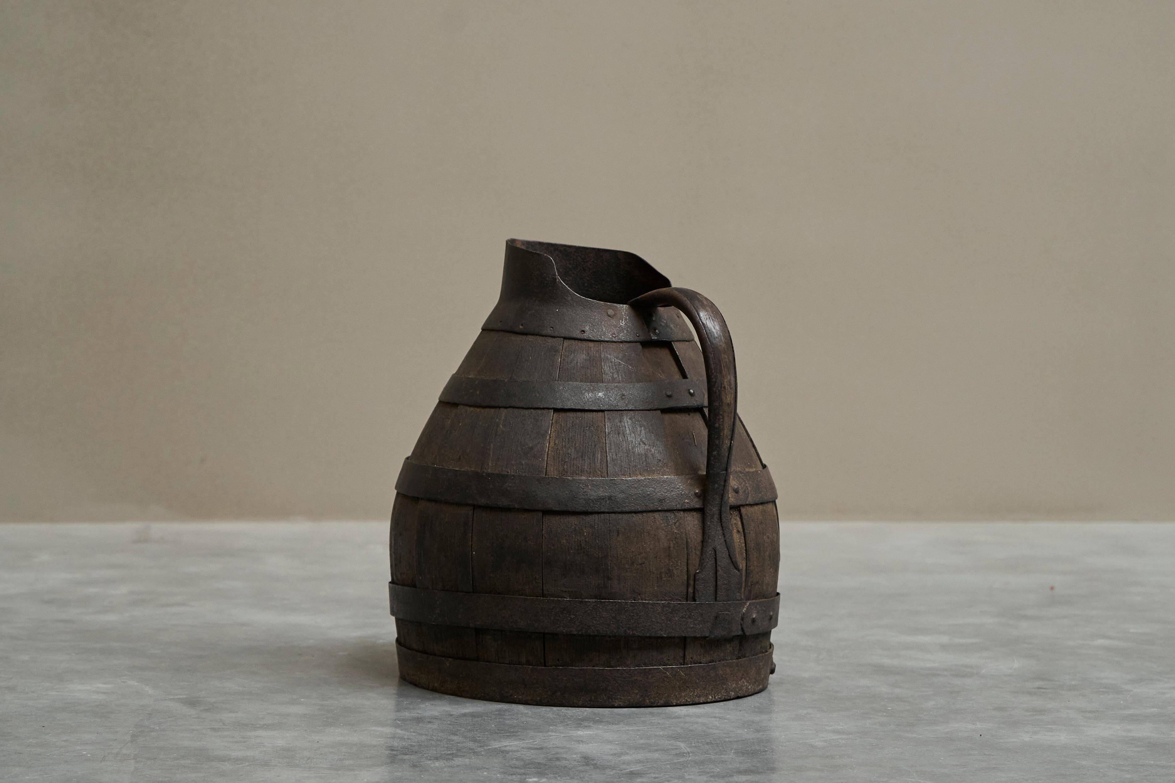 Wabi Sabi cradle in wood and wrought iron