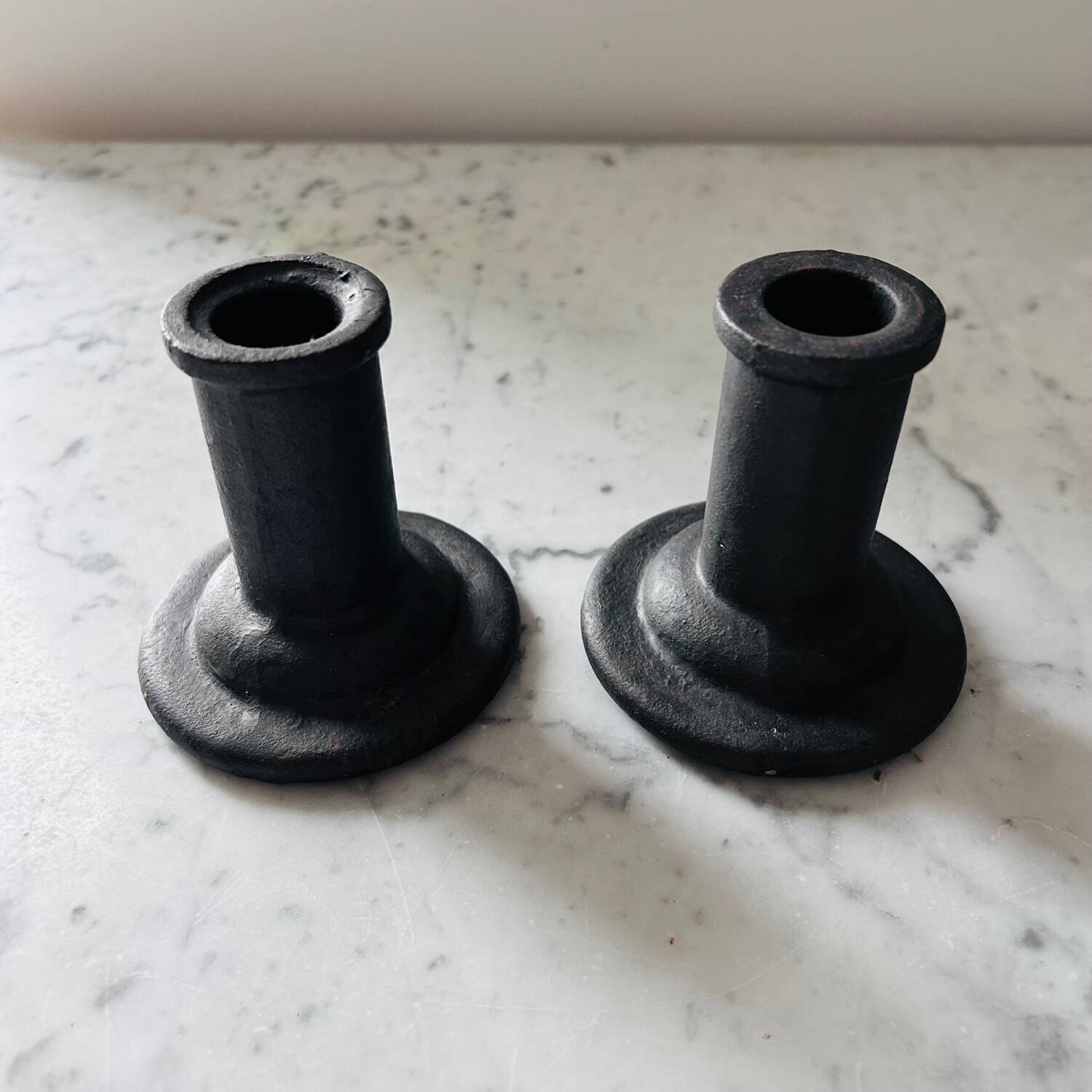 Brutalist cast iron candlestick holders