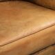 Vintage sheepskin club armchair in a light cognac colour
