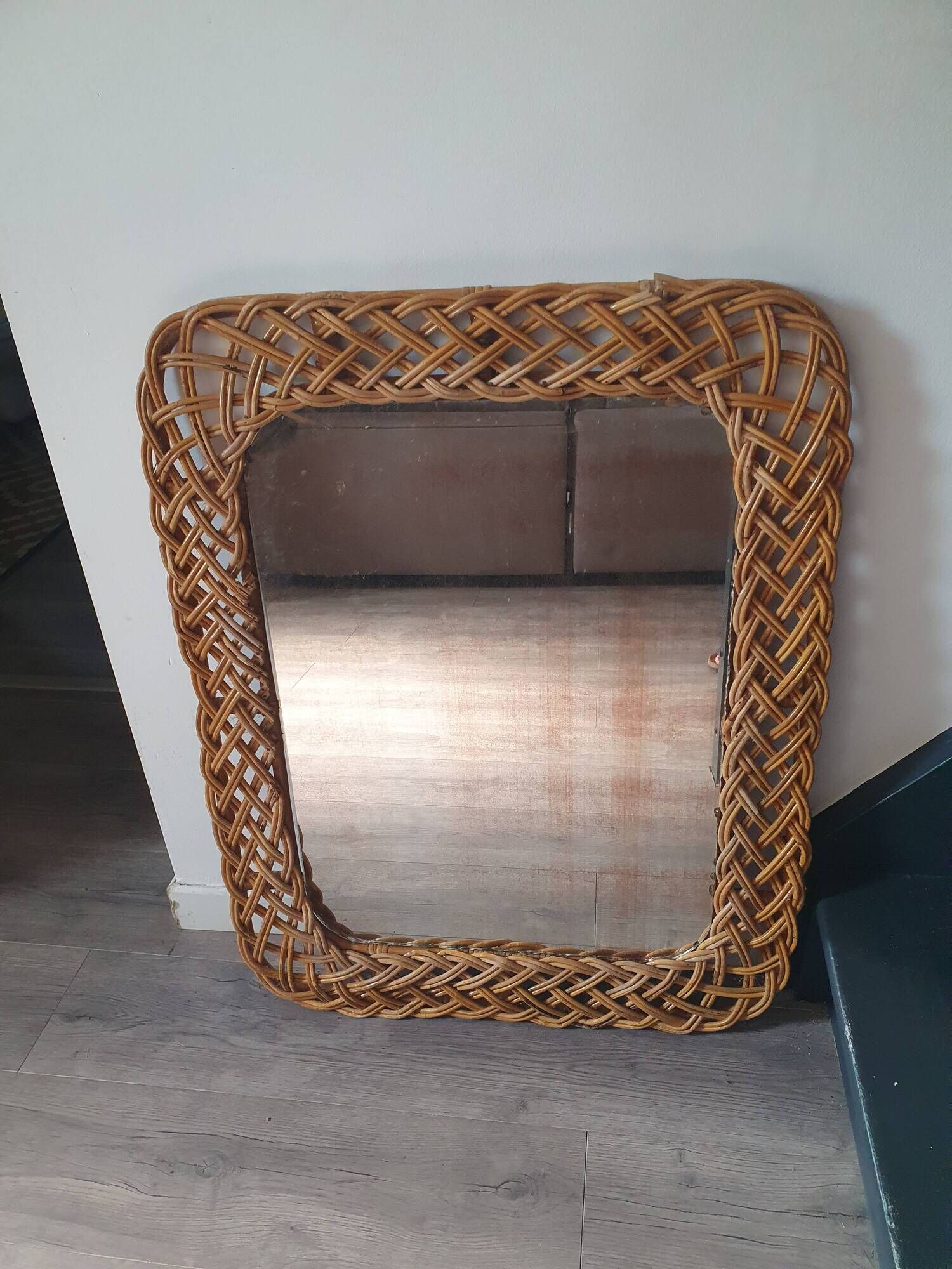 large vintage mirror in woven rattan 66 86 cm with some defects