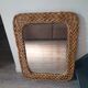large vintage mirror in woven rattan 66 86 cm with some defects