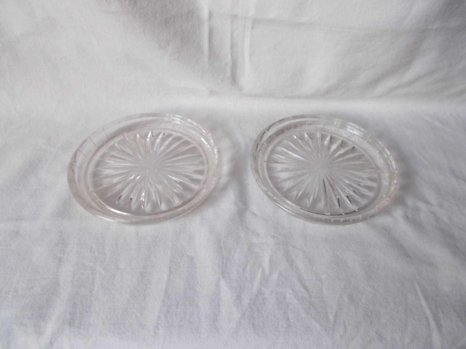 Pair of molded glass bottle mats