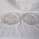 Pair of molded glass bottle mats