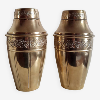 Duo of art deco embossed brass vases