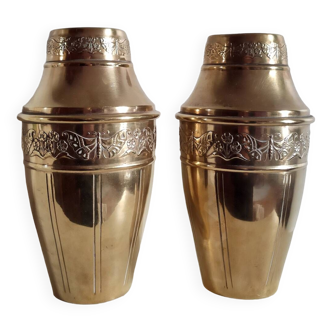 Duo of art deco embossed brass vases