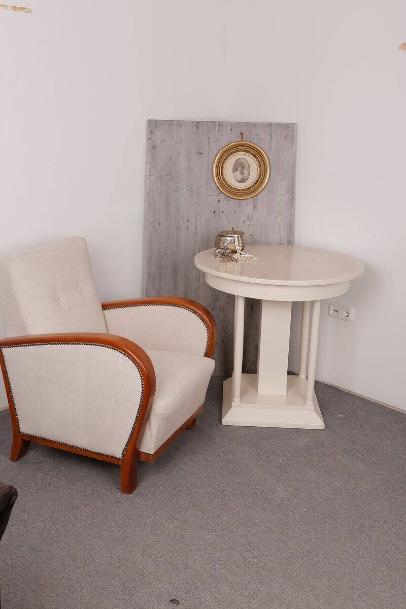 Art Deco armchair from the 1930s in beige fabric and carved wood, Hungarian origin.