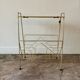 End table, Erdecor magazine holder in gold metal and black glass
