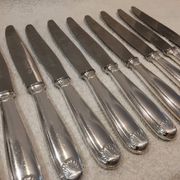 12 silver-plated table knives by Christofle Vendôme, 24.6cm