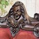Fauteuil en acajou 19ème richement sculpté de style baroque