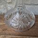 Antique cut crystal decanter with stopper.