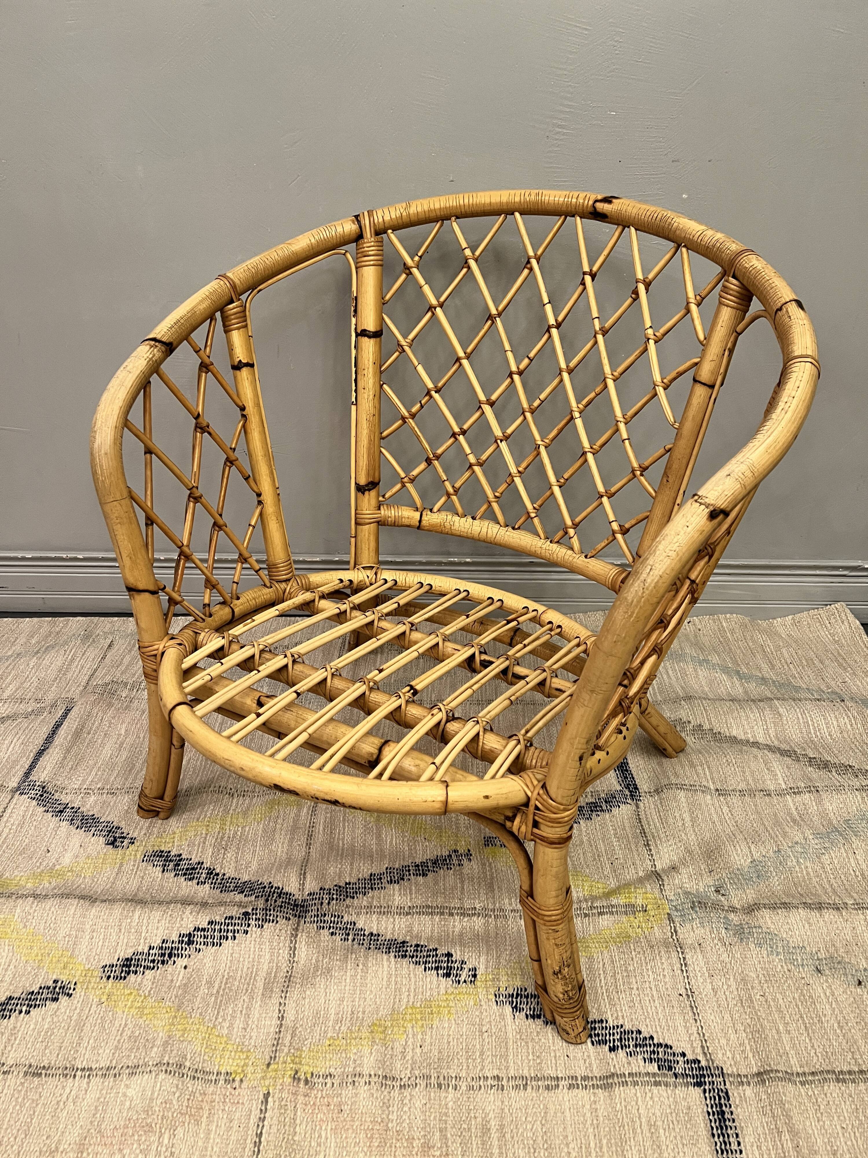 Trio of rattan armchairs