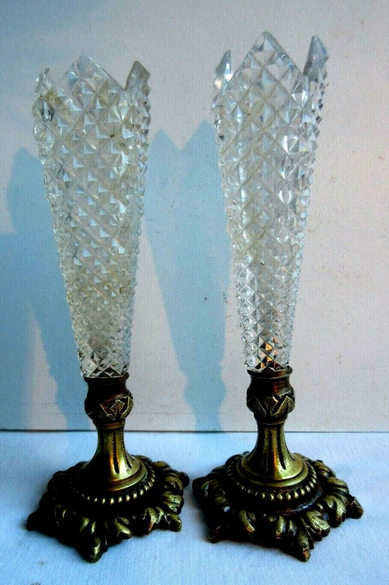 Duo of crystal vases Baccarat Le Creusot, carnation holder, bronze foot