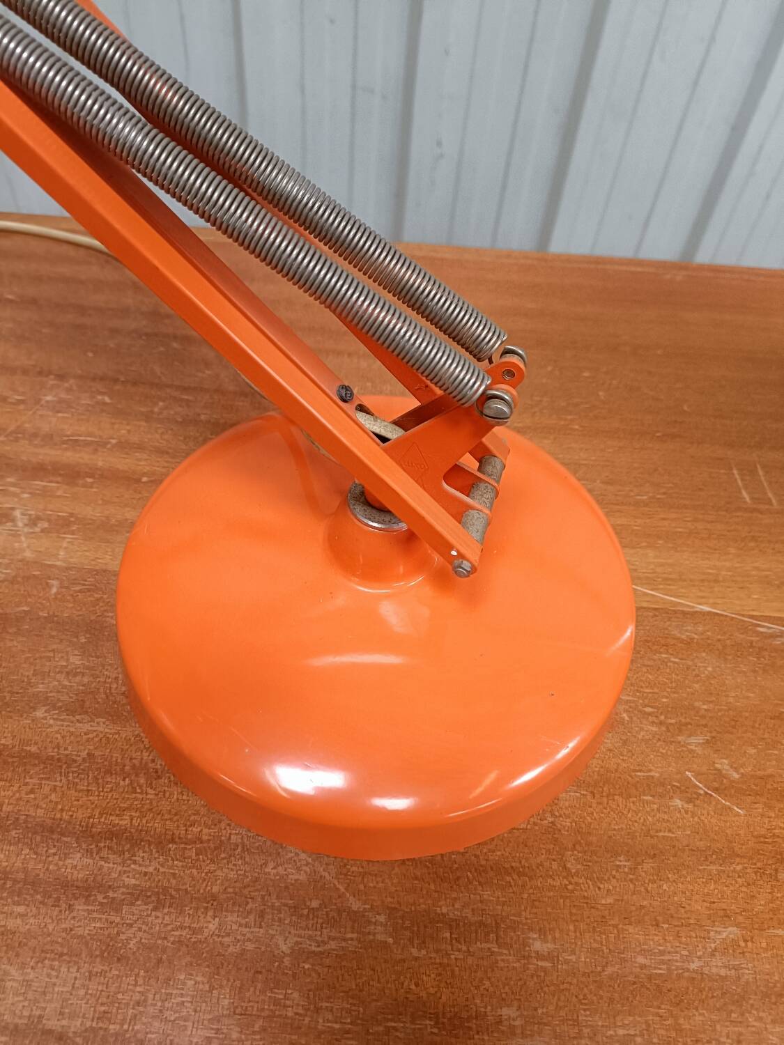 Luxo L4 vintage orange lamp with foot