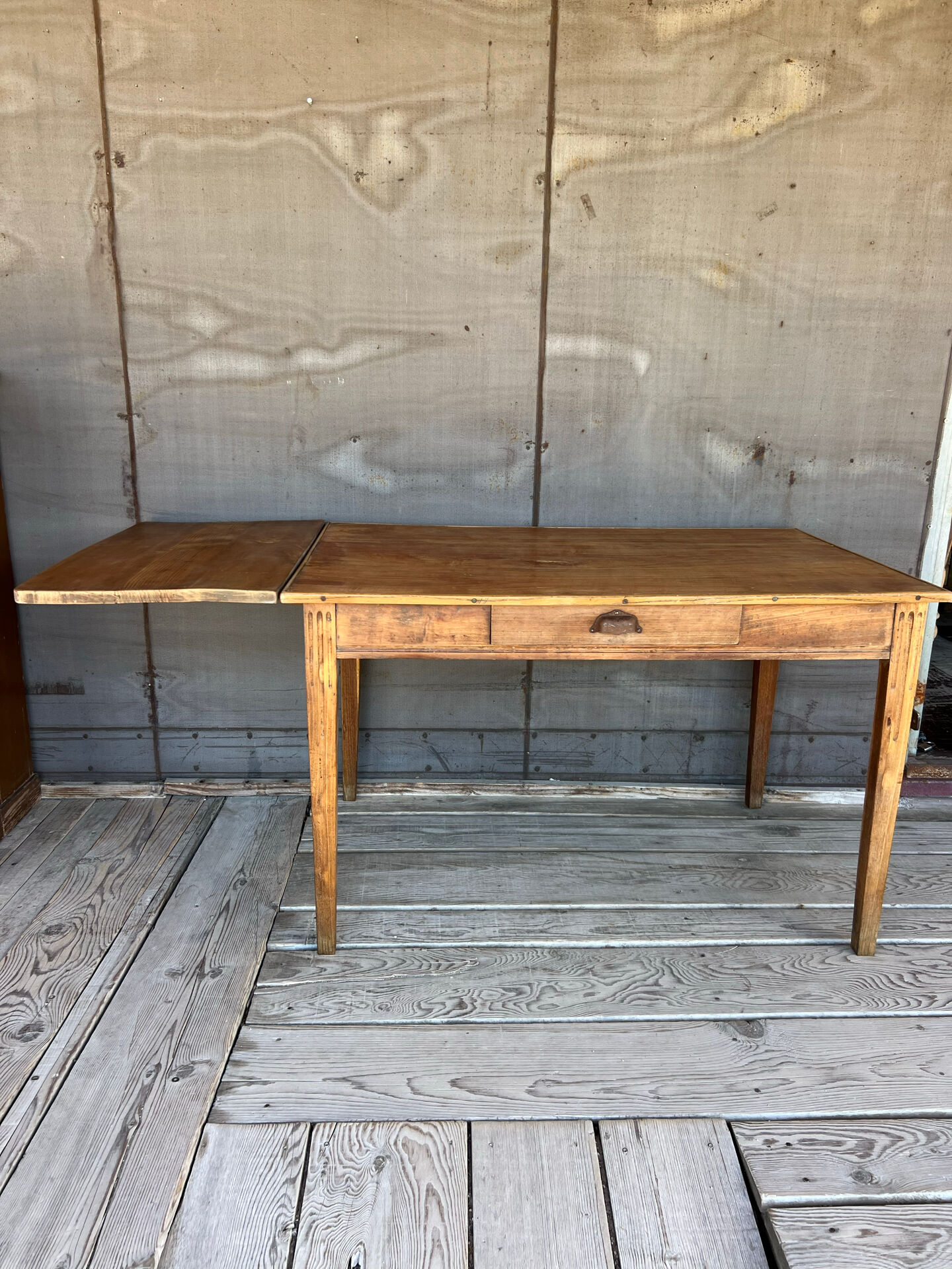 Old raw wood table with extension