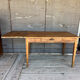 Old raw wood table with extension