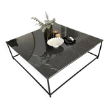 Coffee table with ceramic top and wrought iron base
