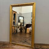 Old gilded fireplace mirror