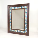 Mirror with wooden frame and painted ceramic tiles