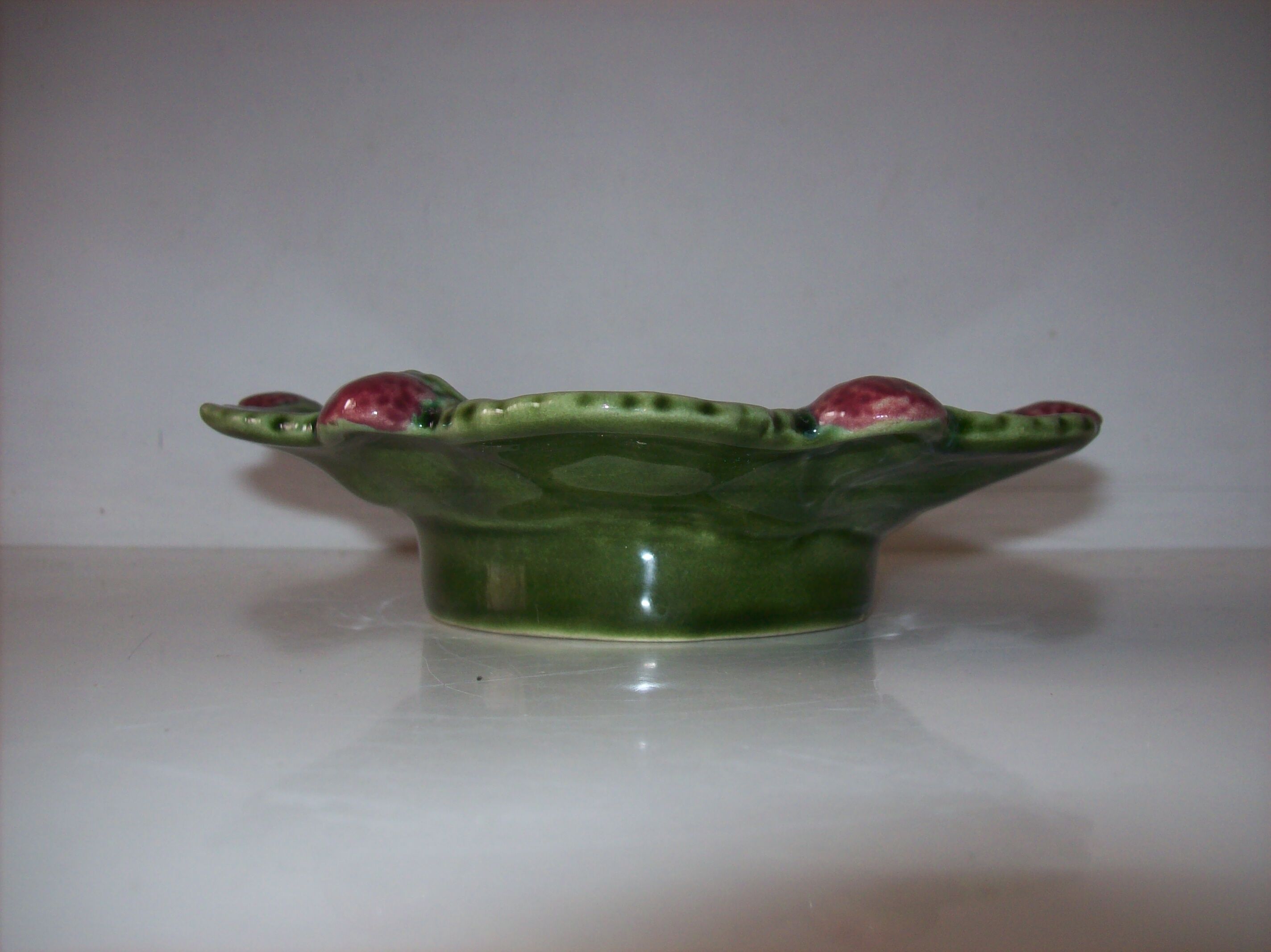 Tidy with raspberry decoration