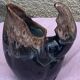 Vintage and numbered glazed ceramic decanter