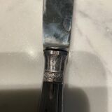 12 couteaux . métal argenté . art deco