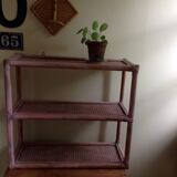 Pink rattan and cane shelf
