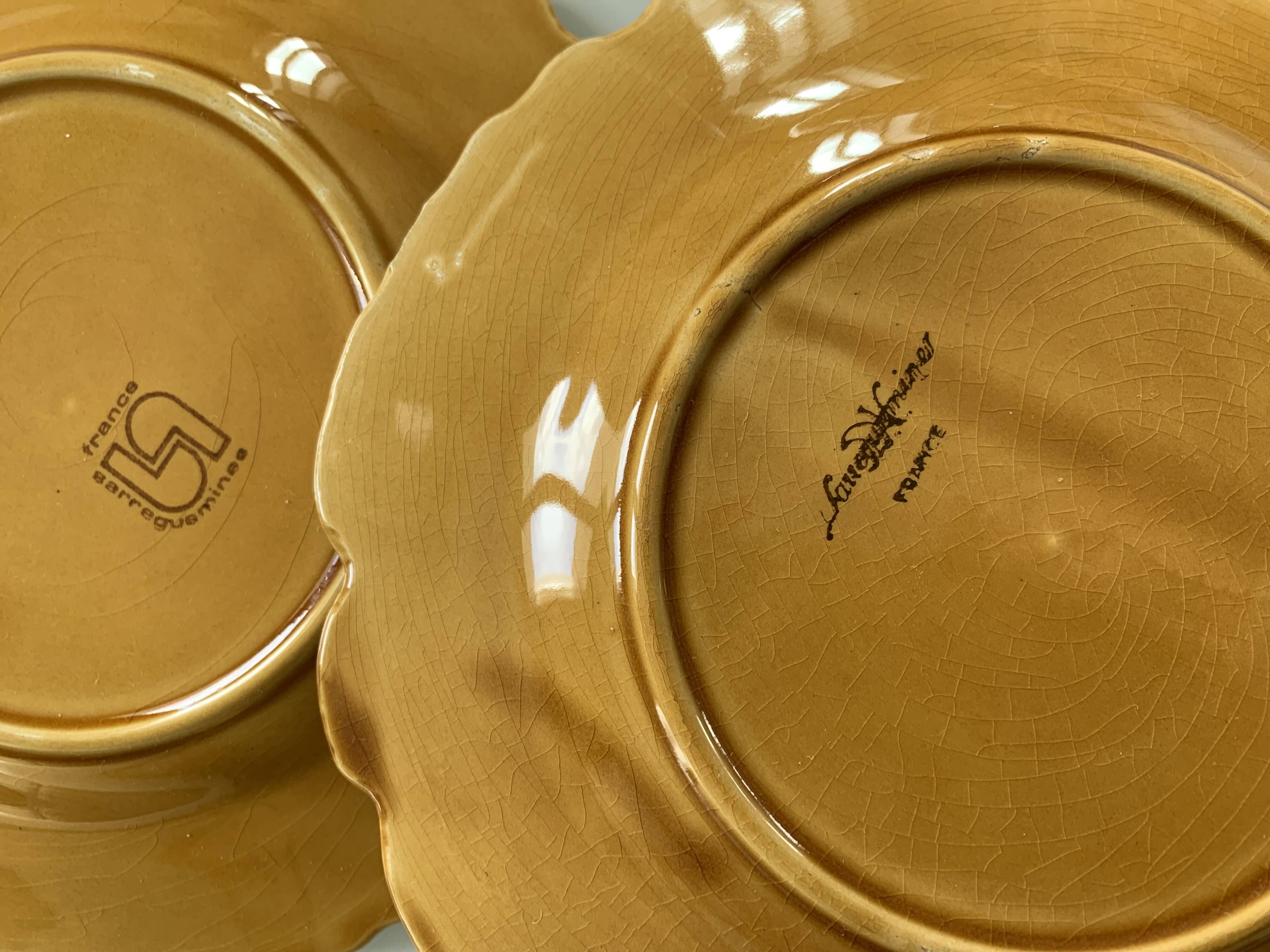 8 old Sarreguemines earthenware slip plates